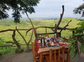 Pumba Safari Cottages，位于Busonga的酒店