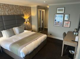 埃塞克斯高尔夫&乡村俱乐部酒店，位于科格索尔的酒店