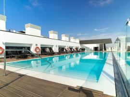 Hotel Giralda Center，位于塞维利亚的带泳池的酒店