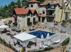 The Stone Castle Boutique Hotel，位于Ağaçlı的酒店