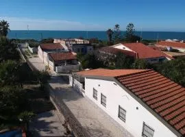 Edoné, Wohnung mit Blick auf einen Sandstrand