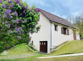 Maison chaleureuse dans un écrin de verdure
