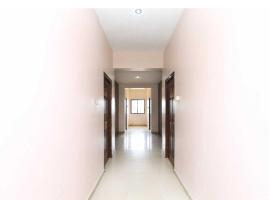 Hotel O Kamadhenu Lodge，位于Neyveli的酒店