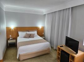 Flat Hotel Slaviero Guarulhos，位于瓜鲁柳斯瓜鲁柳斯国际机场 - GRU附近的酒店