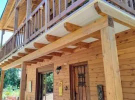 Preciosa cabaña con jardín y barbacoa