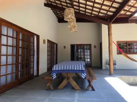 Casa Morena Luz - espaço e conforto, perto da praia，位于库穆鲁沙蒂巴的度假屋