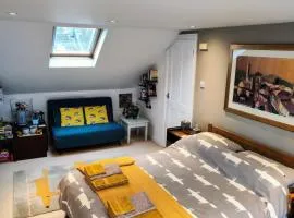 Large light loft room - en suite