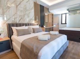 John & Mary Suites，位于罗希姆诺的带按摩浴缸的酒店