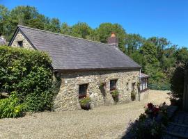 Old Stable Cottage Nanternis，位于Llanllwchaiarn的度假屋