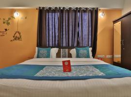 Super OYO Hotel Siddharth Inn，位于甘地讷格尔圣雄曼迪尔会展中心附近的酒店