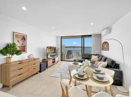 Modern 1-Bedroom Apt with Sweeping Water Views