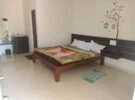 Lake View Homestay - Kushalnagar，位于库斯哈尔纳加尔的酒店