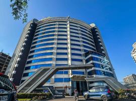 Ambition studio apartment at rajhans belliza，位于Dumas的酒店