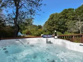 Waterfront home with Hot Tub Firepit and Game Room