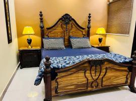 Bahria Town Lahore - NEXT INN Two Bedroom condo with free parking 203