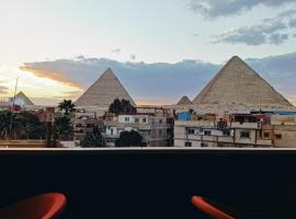 Fantastic three pyramids view，位于开罗吉萨的酒店