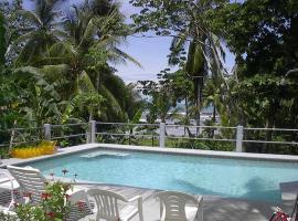 Coconut Grove Oceanfront Cottages，位于多米尼克的酒店