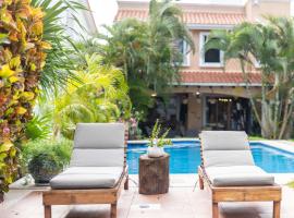 Magnifica Villa Palmeras Pok ta Pok Zona Hotelera Cancun，位于坎昆的度假屋