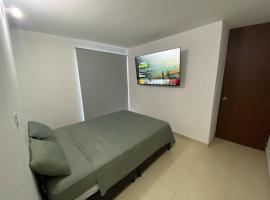 Habitación en Apartamento amplio cómodo y equipado，位于库库塔的酒店
