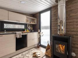 KARPALO Lapland Riverside Cabin with Sauna Fireplace BBQ WiFi Ski Ylläs PetsOK，位于阿卡斯洛姆波罗的酒店