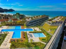 Resort frente ao mar apto 1222 DNA Praia Grande