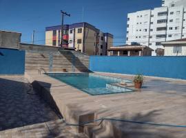 50 metros da praia piscina e churras，位于蒙加瓜的酒店