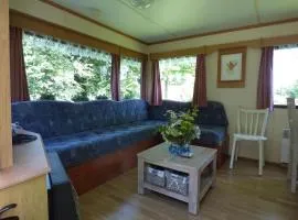 Well-equipped mobile home with garden in Normandy