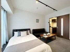 bHOTEL Nagomi - Cozy 1BR Apartment with Balcony for 3Ppl