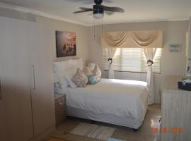 Ocean Tribe Guest Cottage，位于乌姆科马斯的民宿