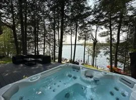 Waterfront open concept dream cottage with hot tub