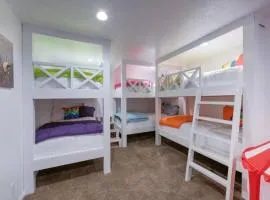 Fully loaded, 12 beds, cool bunk room, hot tub!