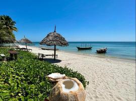 Afro Rooms & Tents in The Beach，位于基林多尼的住宿加早餐旅馆