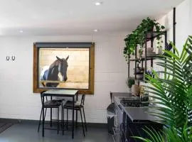 Sleep next to a Horse in a stable by the city !