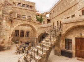 特米尼伊维酒店，位于于尔居普的酒店