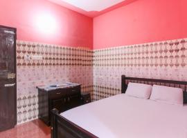 OYO Hotel Sree Bhadra Tourist Home，位于奎隆的酒店