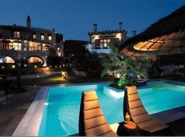 埃克瓦吉斯套房&Spa酒店，位于科罗皮的家庭/亲子酒店