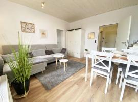 Ferien im Wangerland - Haus Wiesenweg - Ferienwohnung 1 1OG，位于霍鲁梅尔希尔的酒店