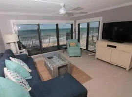 Corner oceanfront views with wrap around balcony located on the no-drive beach!