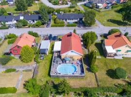 Amazing Home In Vstervik With Heated Swimming Pool
