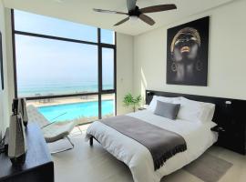 Luxury Beachfront Condo in Rosarito Pool & Jacuzzi，位于罗萨里托的酒店