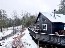 Serene Retreat on a Stream