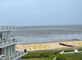 Traumhafte Ferienwohnung - direkter Meerblick - 50m zum Strand in Cuxhaven Duhnen in 1A Lage im Haus Seehütte，位于库克斯港的自助式住宿
