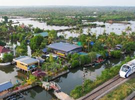 Bell Farms and Resorts，位于Munroe Island阿什塔木迪湖附近的酒店