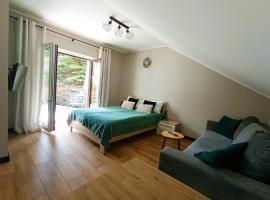 Apartament Olimpijski B&B w Szczyrku，位于什切尔克吉尔纳-哈拉斯科尔吉森斯卡1号缆车附近的酒店