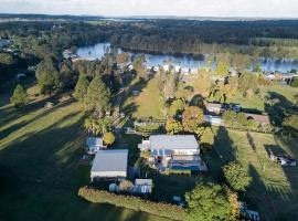 Dora Creek Cottage，位于Dora Creek的酒店