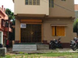 ATITHYA GUEST HOUSE，位于Srī Niketan的酒店