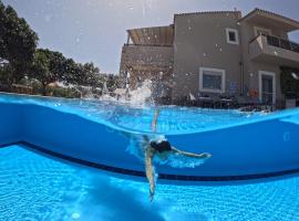 Four Seasons private villa - seaview - big heated pool - gym - sport activities，位于古瓦伊的别墅