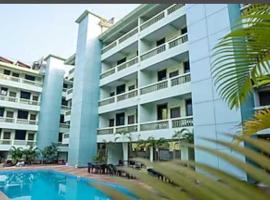 Collection O E Candolim Beach Resort，位于Goa的酒店