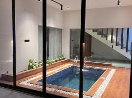 شالية رواء كبلز，位于Ḩarādī的酒店