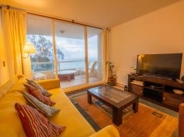 Oceana Suites en Costa Quilen, vistas al mar，位于普琼卡维的带停车场的酒店